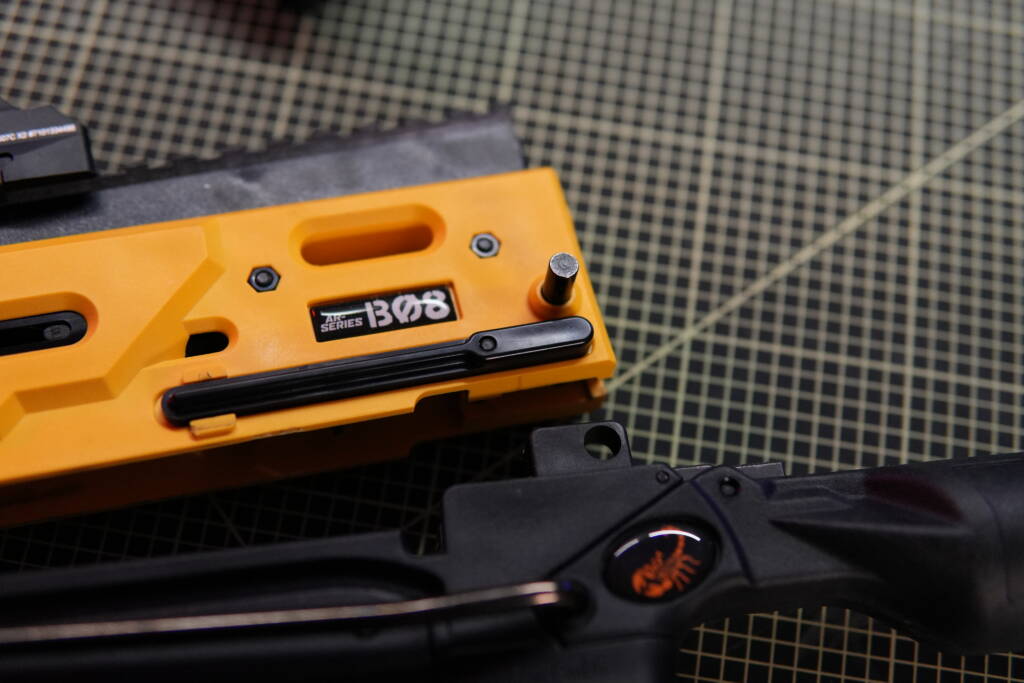 Steambow B08 less-lethal crossbow opened via quick-release pin, showing the upper receiver lifted for fast limb replacement.