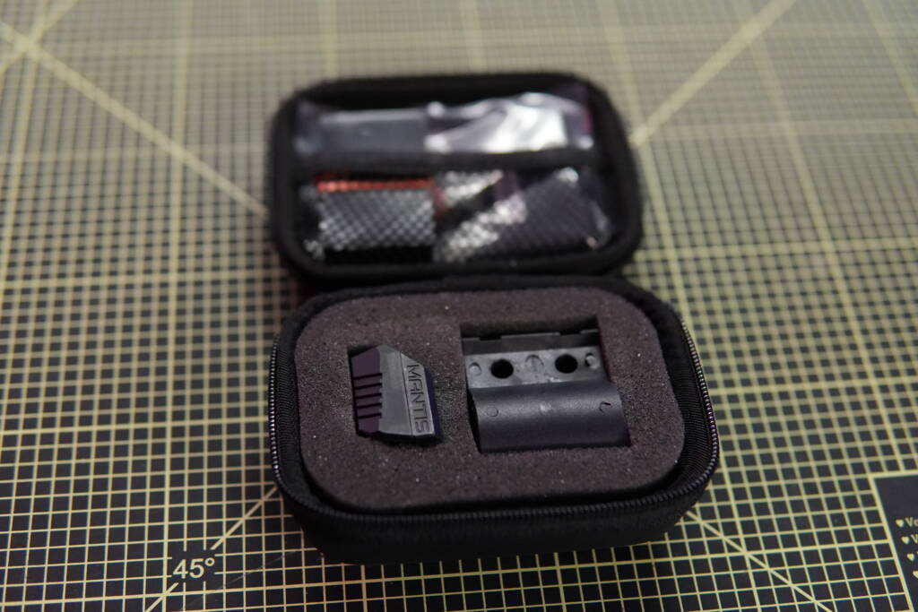 Mantis X10 Elite in protective case with included accessories and mounting adapters.