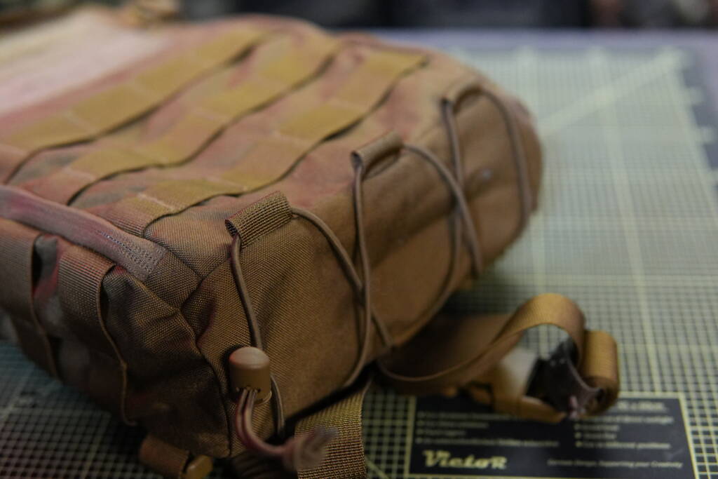 Close-up of Helikon-Tex Guardian Small Pack showing high-quality stitching and durable Cordura-style material.